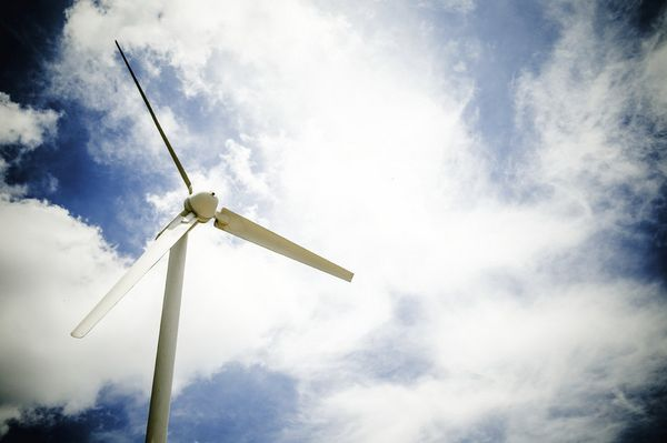 Wind turbine against a cloudy sky